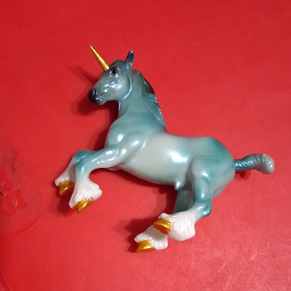 Breyer Teal Unicorn Figure with Gold Horn and Hooves